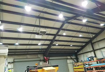 Factory ceiling with high bay lights main - Everything to Know About LED High Bay Lights - Vorlane