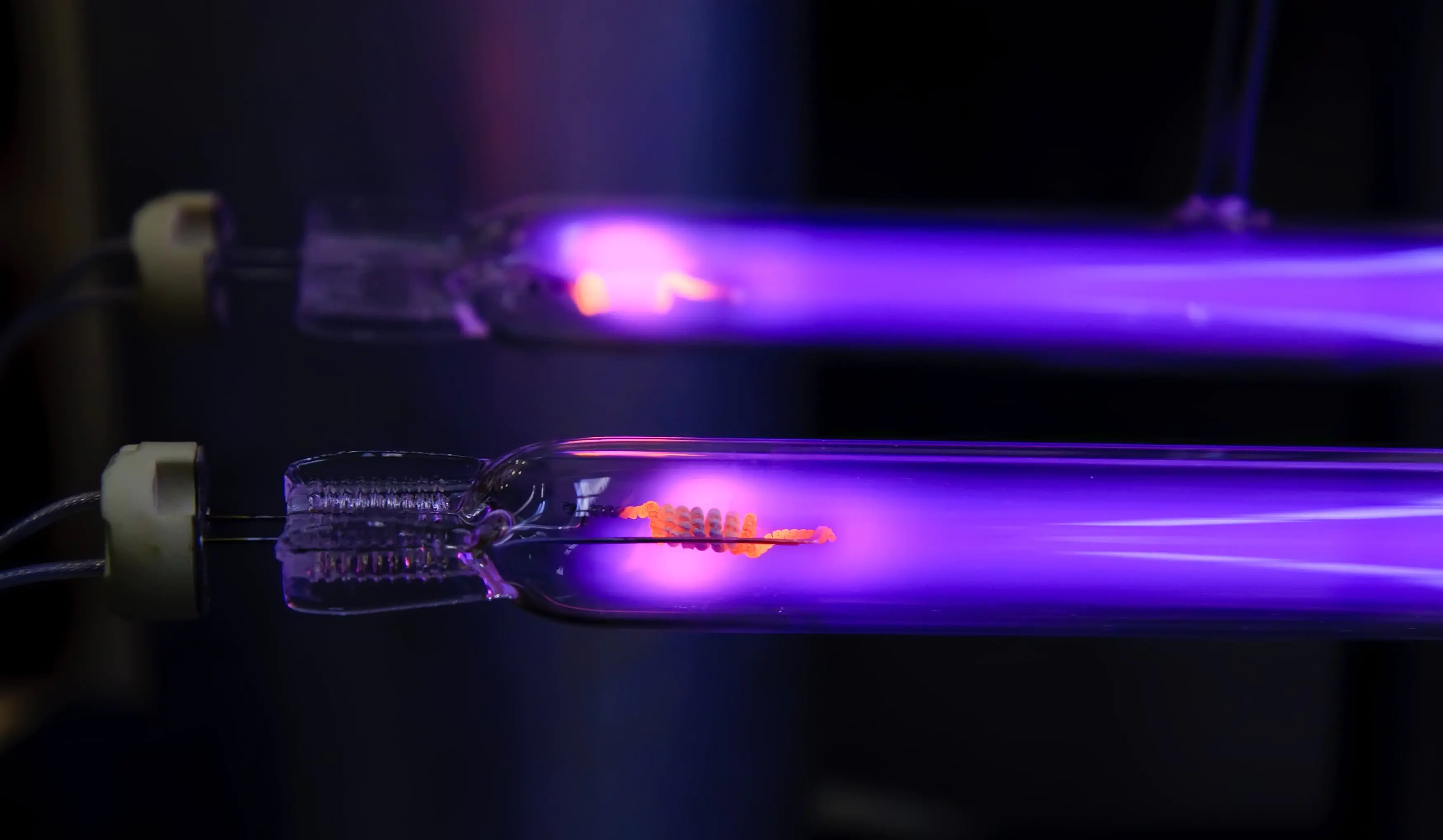 Vivid ultraviolet tubes showcasing different types of UV lighting and their applications - Ultra Violet Lights: Types and Applications - Vorlane